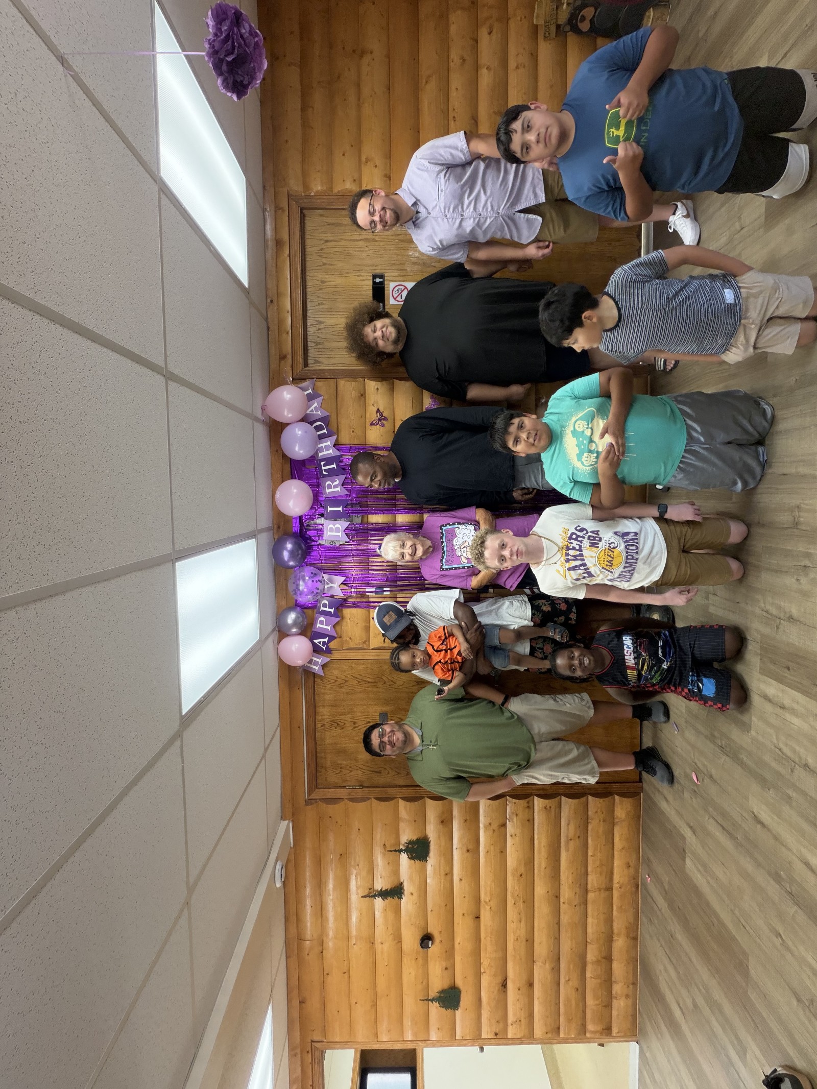 Barbara's 83rd birthday, posing with the men of the family.