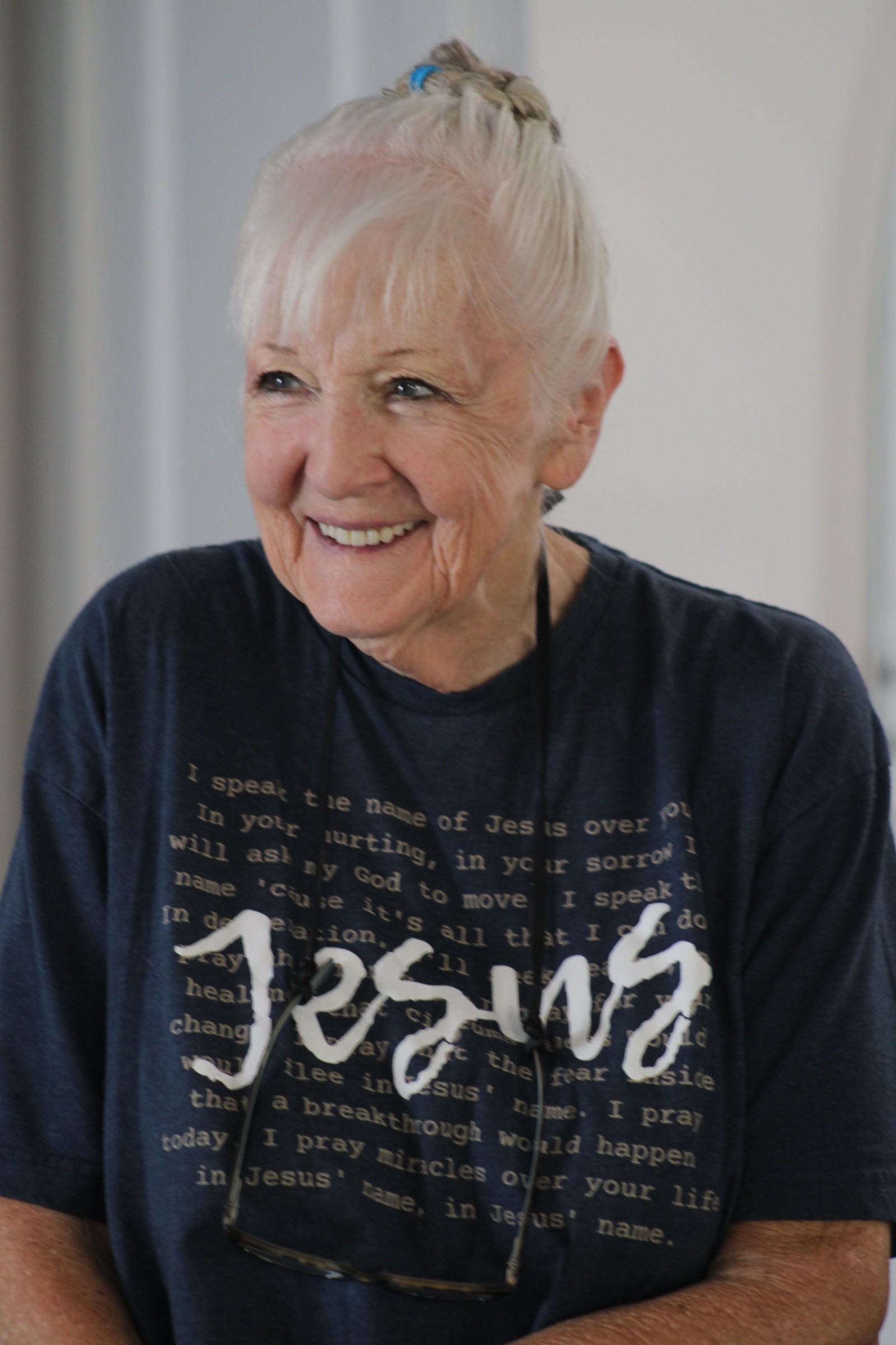 Barbara DeVore looking left smiling